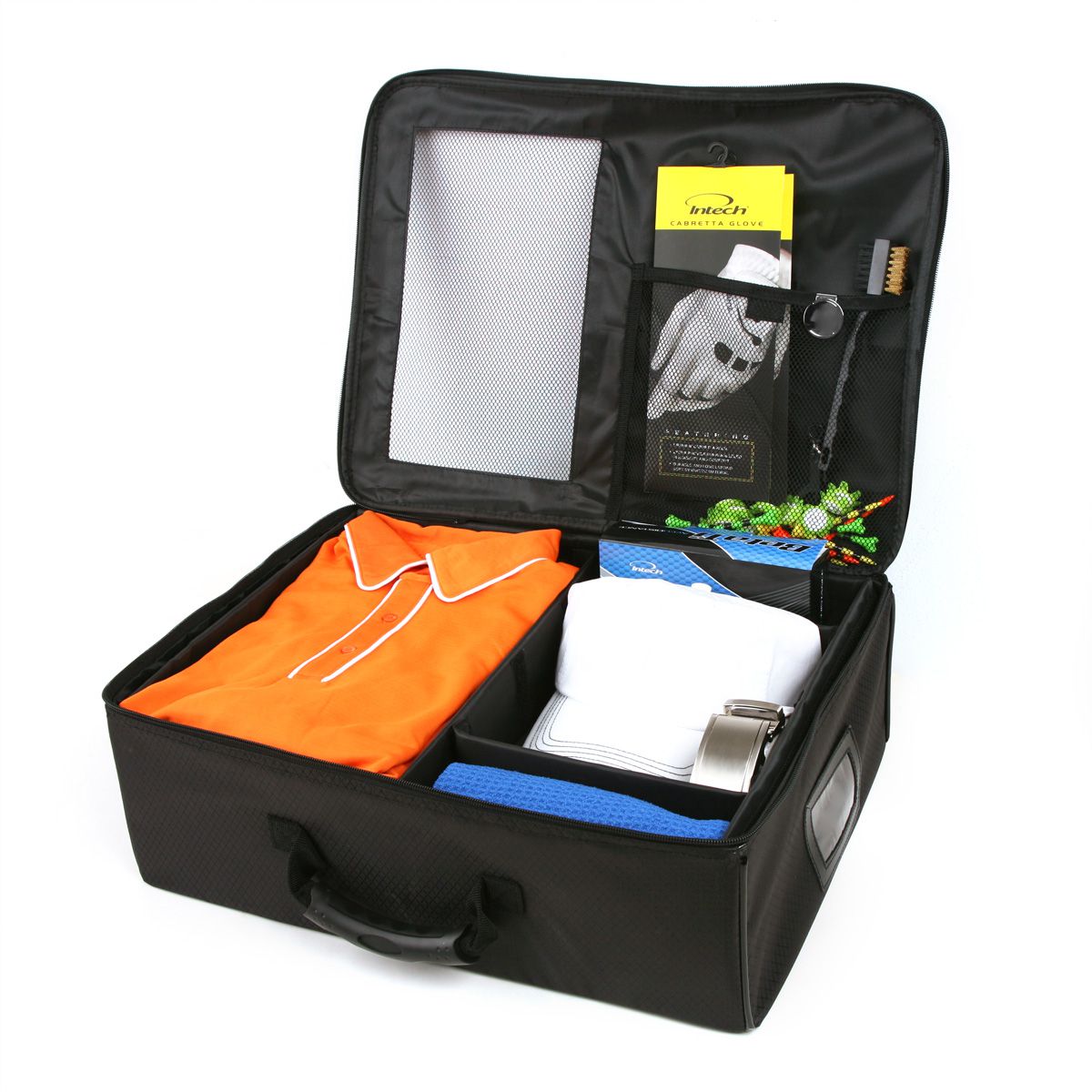 angle top view of an opened Intech Single Row Golf Trunk Organizer with an orange golf shirt, white hat, belt, golf glove, golf cleaning brush and golf tees and replacement golf spikes inside