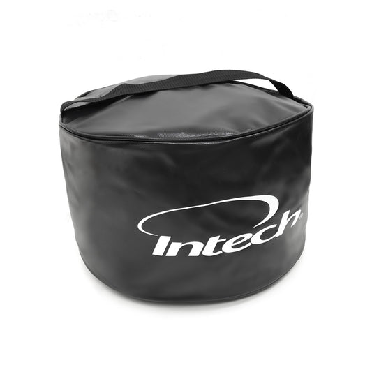 angled top and side view of the Intech Golf Impact Bag with carry handle