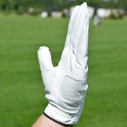 side view of a a left hand Intech Men's Cabretta Leather Golf Glove on someone's left hand