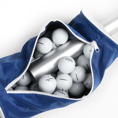 golf balls inside an unzipped blue Intech Golf Ball Shag Bag